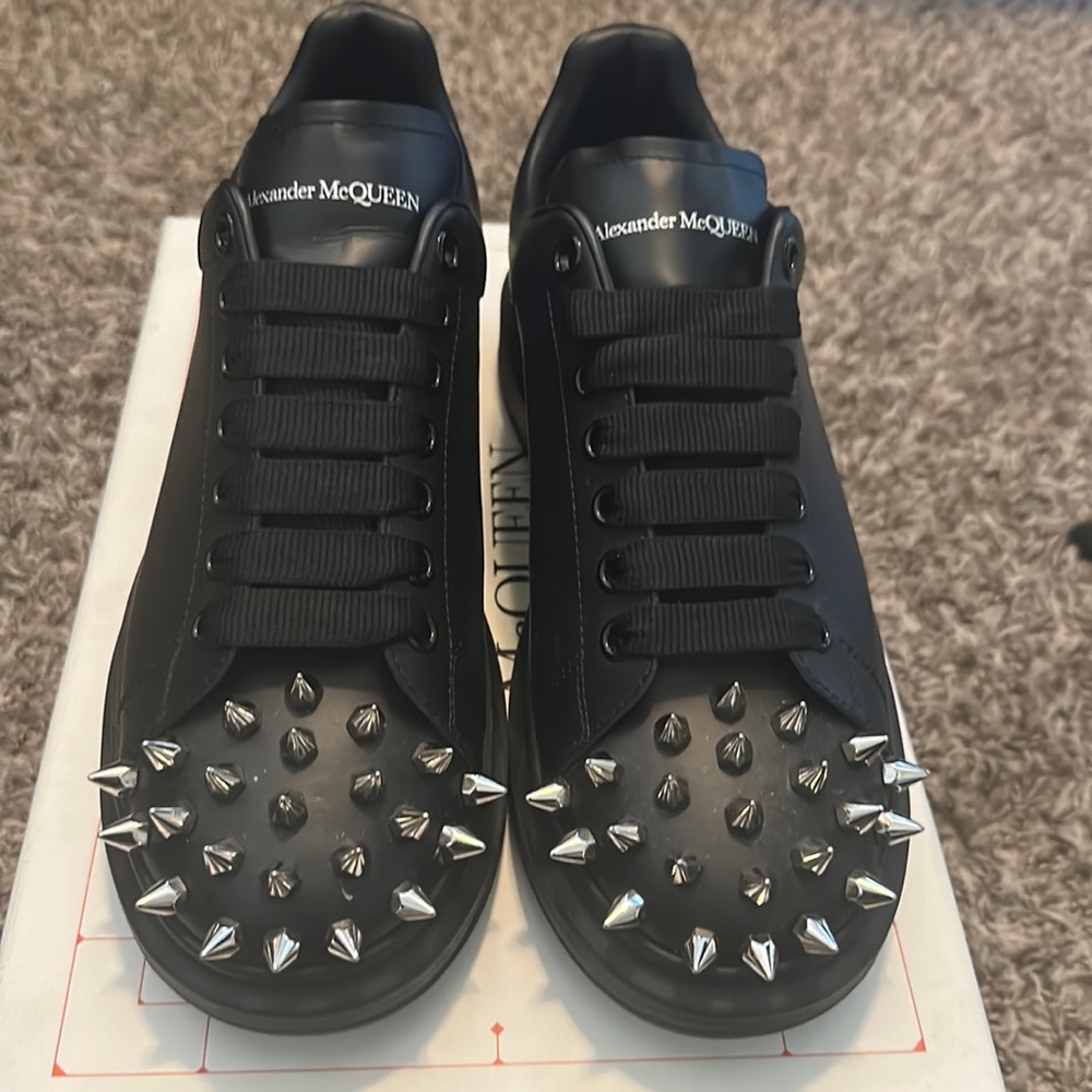 Black Alexander McQueen spike-detail lace-up sneakers